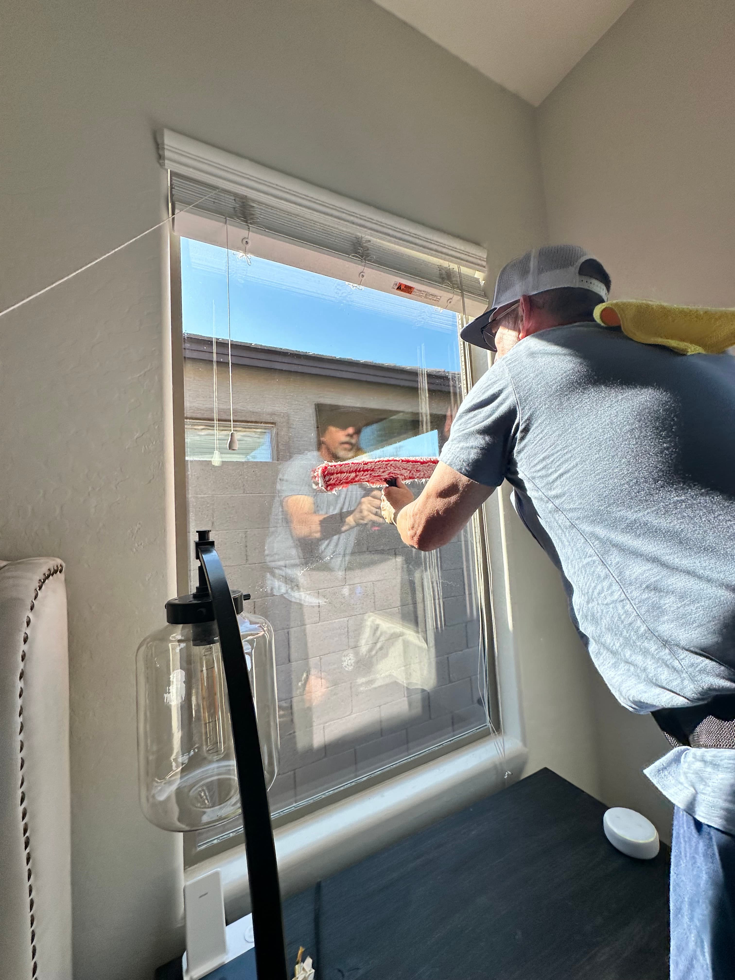 Firefighter Cleaning Windows